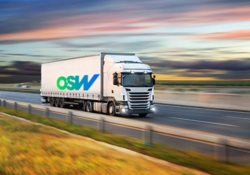 Truck with container on highway, cargo transportation concept. Shaving effect.